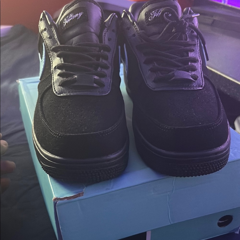 Black Sneakers with Blue Swoosh